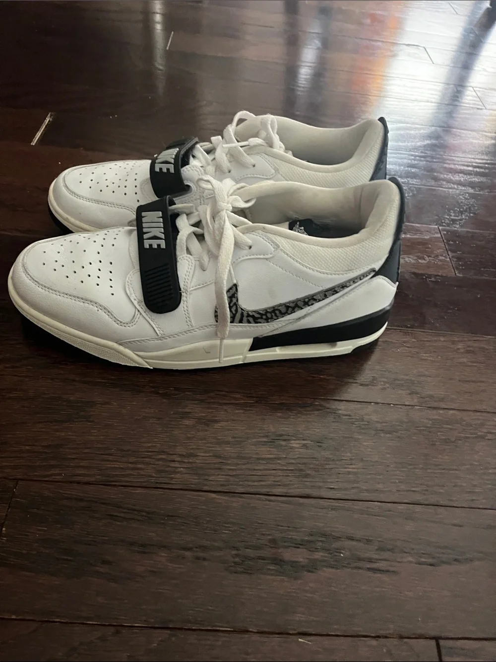 Nike White Low-Top Sneakers with Black Strap Accents